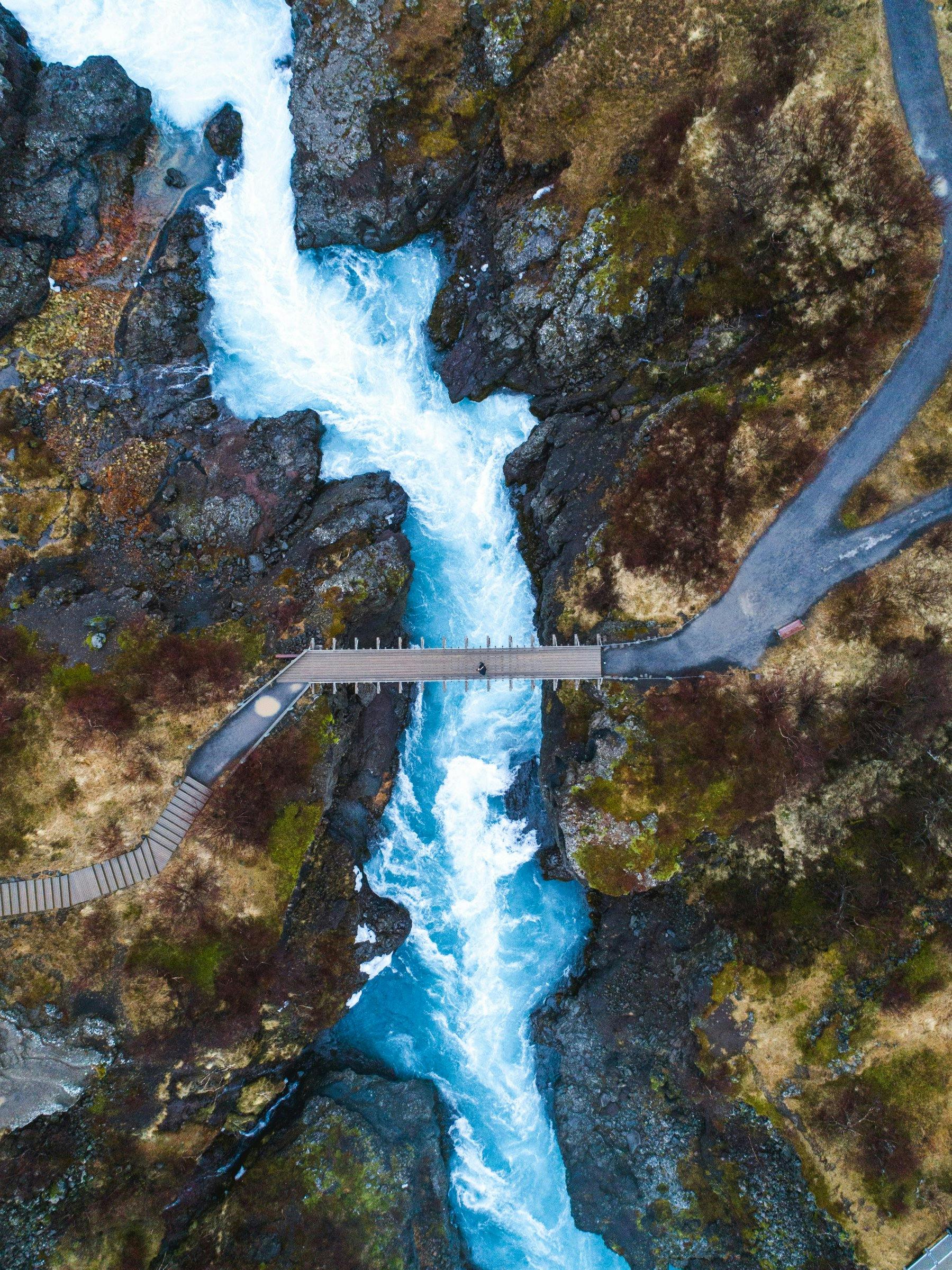 Barnafoss waterfalls and the bridge leading over it