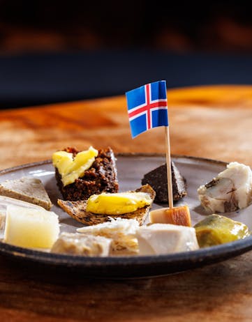Traditional Icelandic meal with a small Icelandic flag in the middle