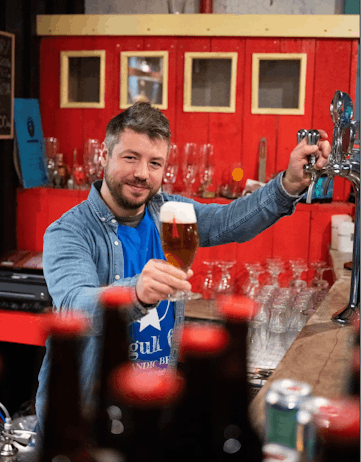 Marteinn Haraldsson owner of Segull 67 holding a beer glass in his brewery