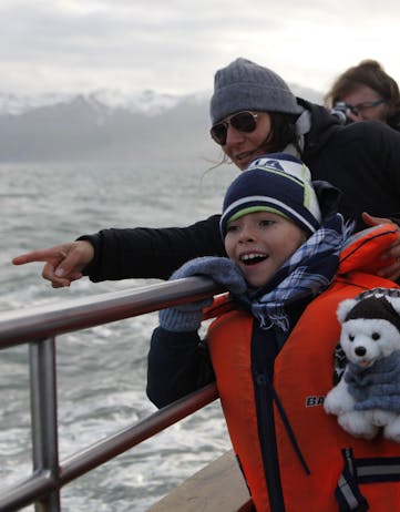 Family on a whale watching boat