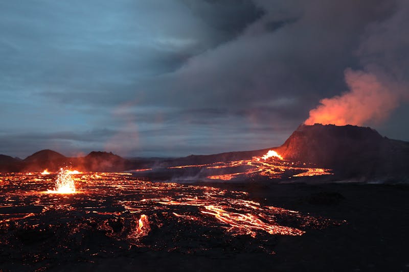 Erupting crater and flowing lava