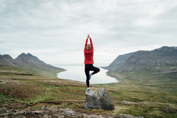 Woman doing a Yoga pose in the Westfjords