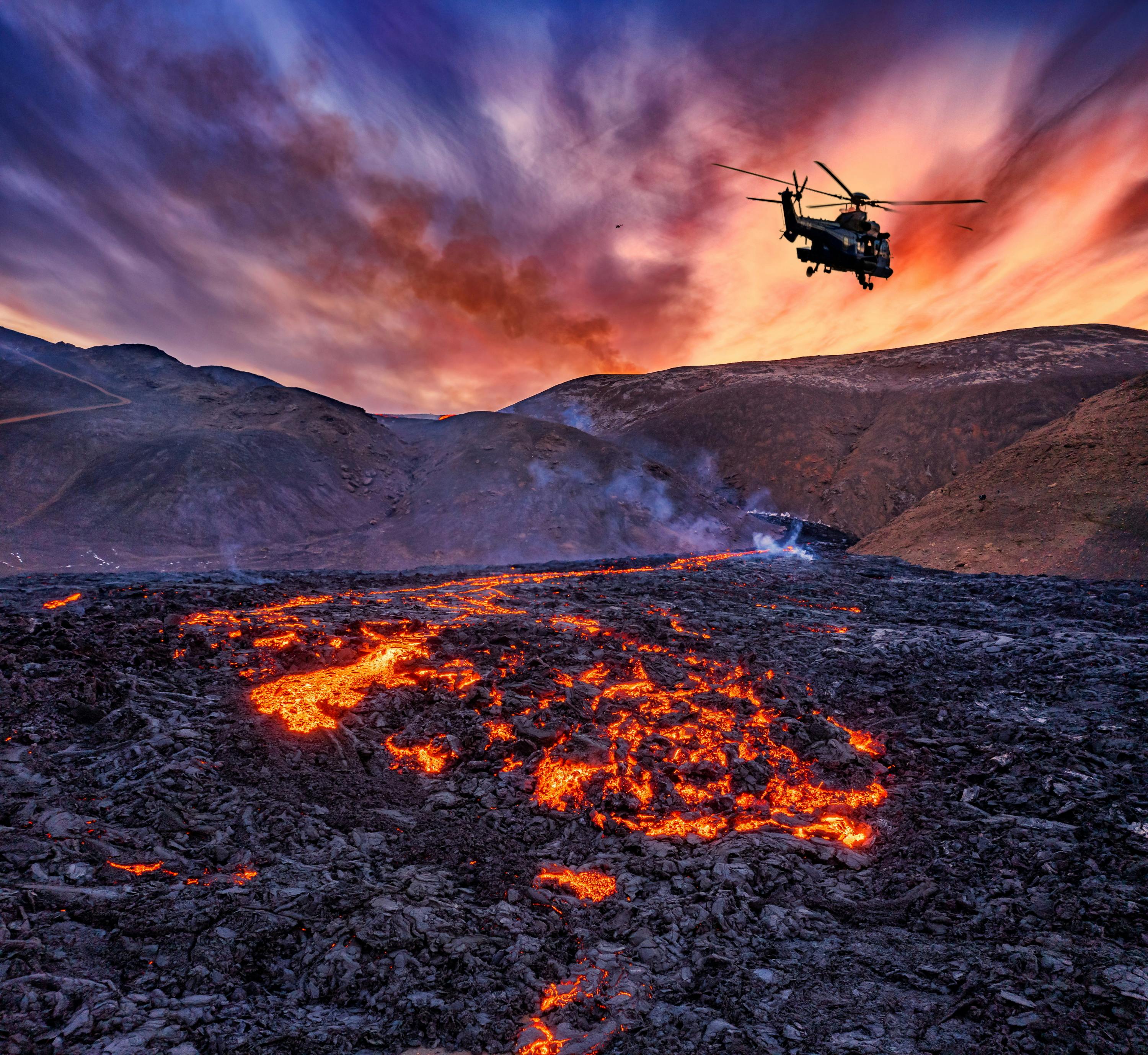 Helicopter flying over Fagradalsfjall volcano in Iceland