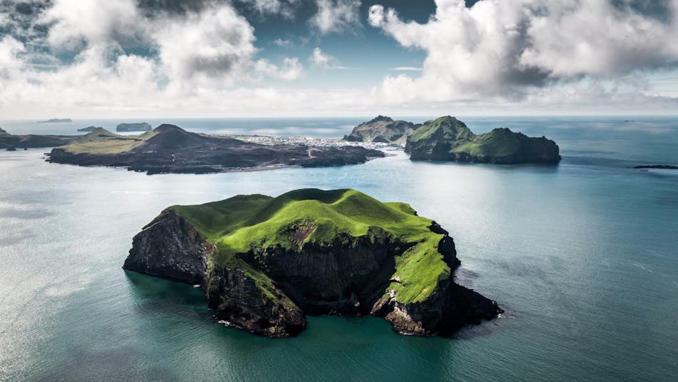 The Westman islands archipelago rising from the sea