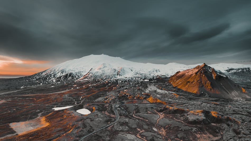 Snow covered Snaefellsjokull volcano and Stapafell mountain