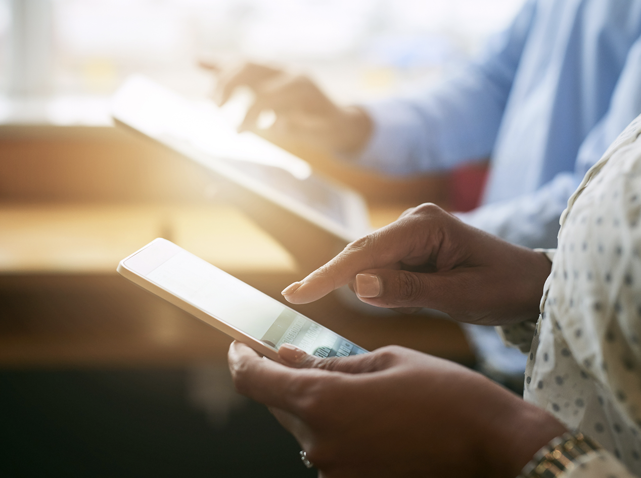 Tax-compliant POS payments — business user tapping a tablet running viva.com Terminal app, supporting Android, iOS and Windows with VAT-compliant receipts and real-time tax reporting