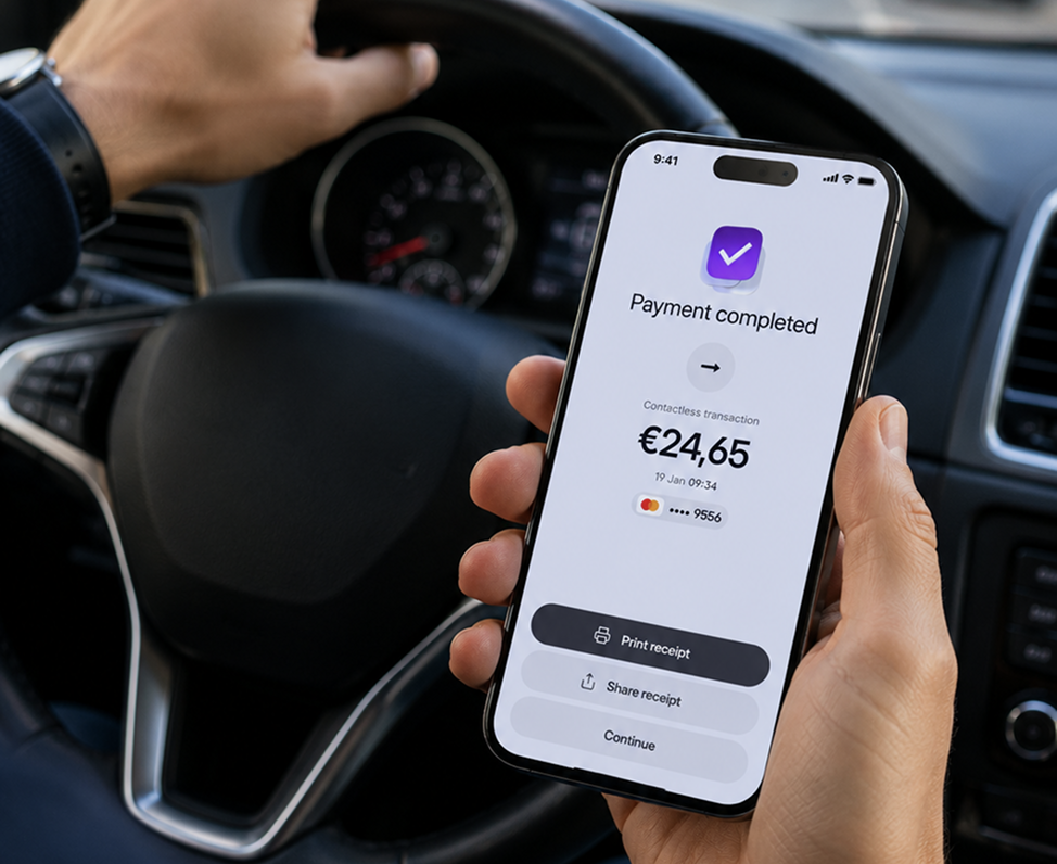 Mobility payment solution — driver holding smartphone showing viva.com Terminal app payment completed screen, contactless transaction confirmed in car rental or taxi service