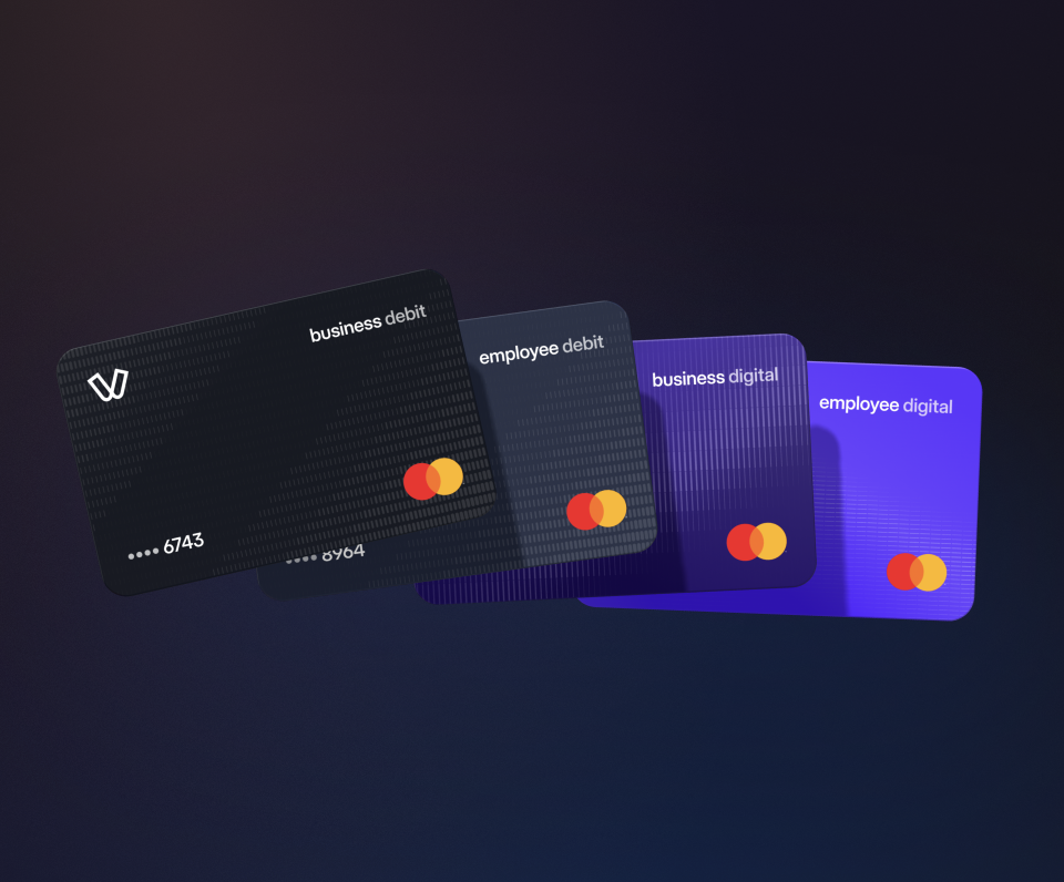 Four Viva.com Mastercard cards fanned out on a dark background: a black Business Debit card, a dark grey Employee Debit card, a deep purple Business Digital card, and a bright purple Employee Digital card