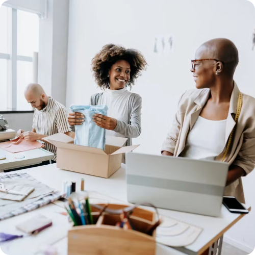 Small business team using online payment solutions to manage eCommerce orders and digital transactions
