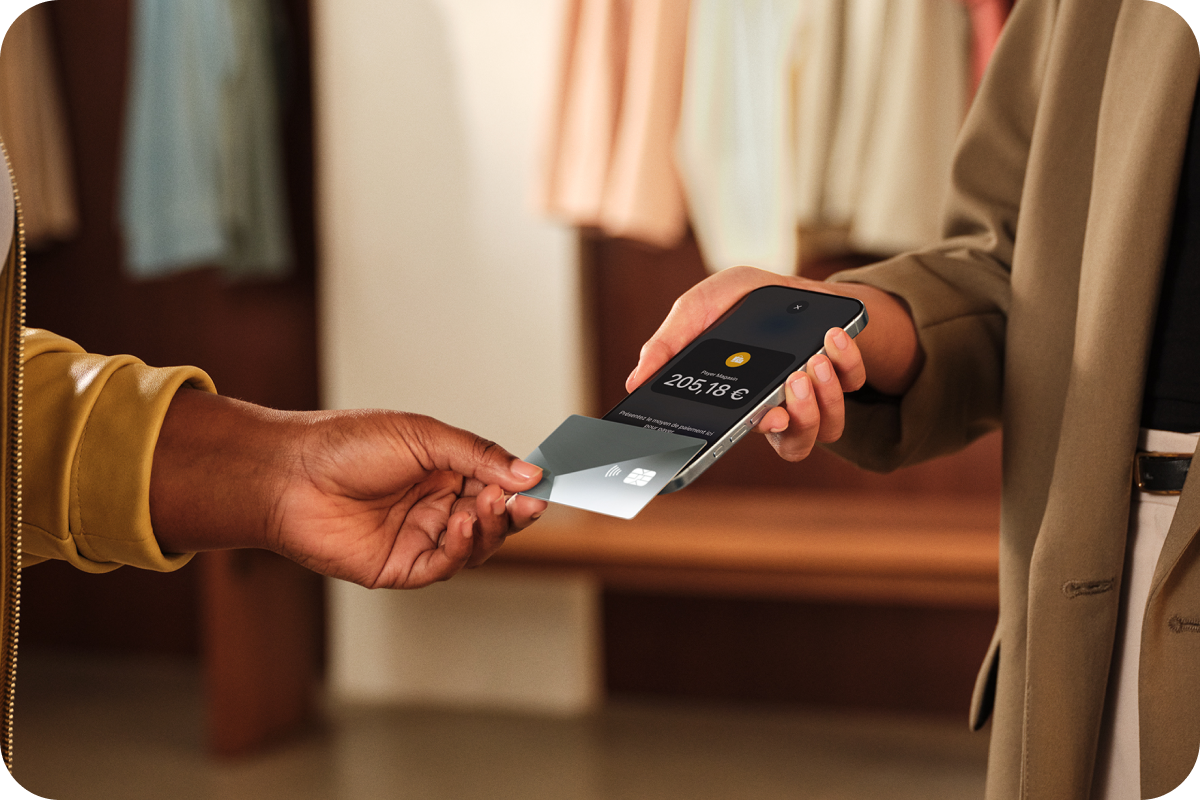 Customer making a contactless card payment using Tap to Pay on iPhone at a retail store
