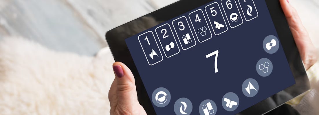 elderly person holding a tablet