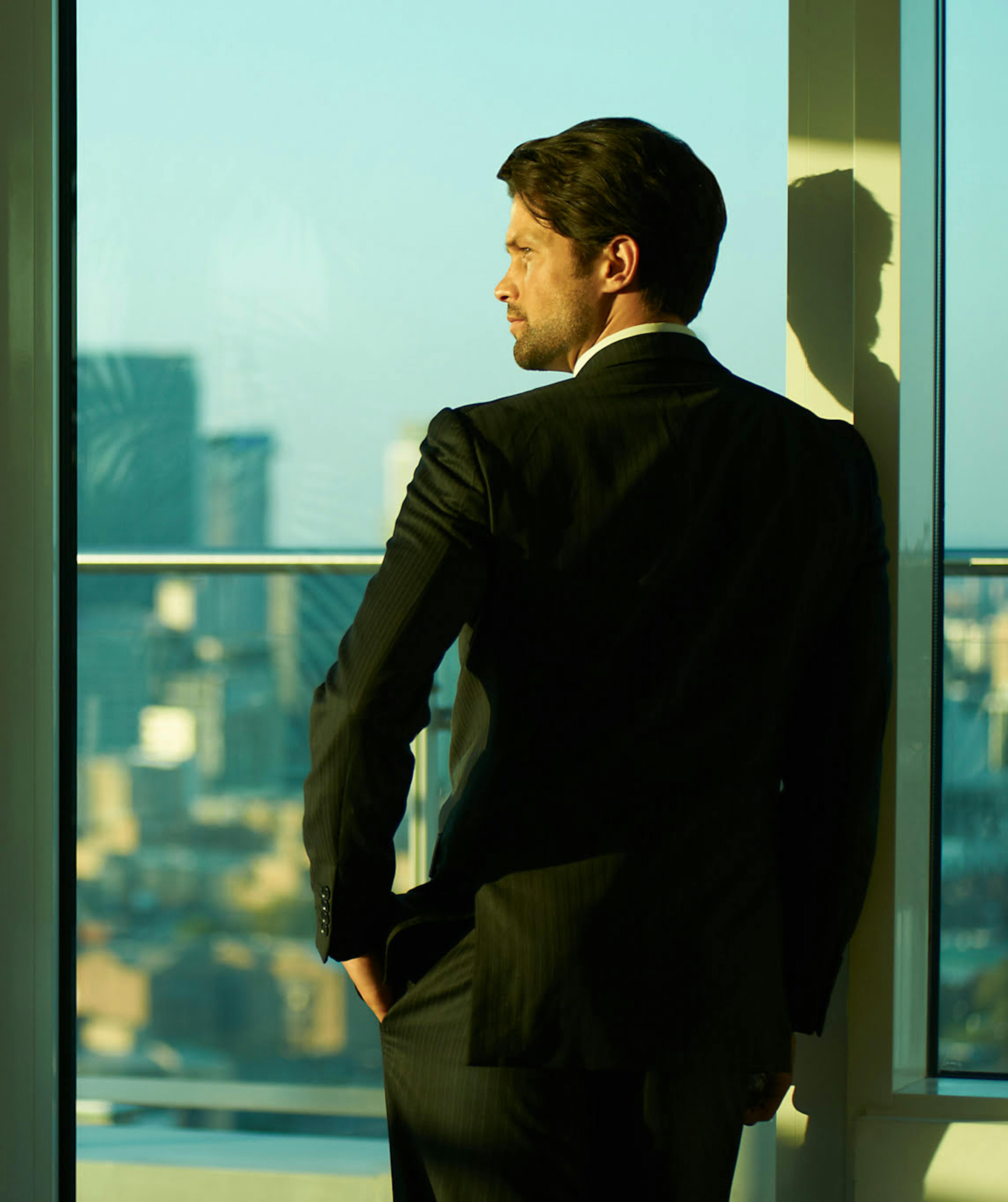 Business man at window