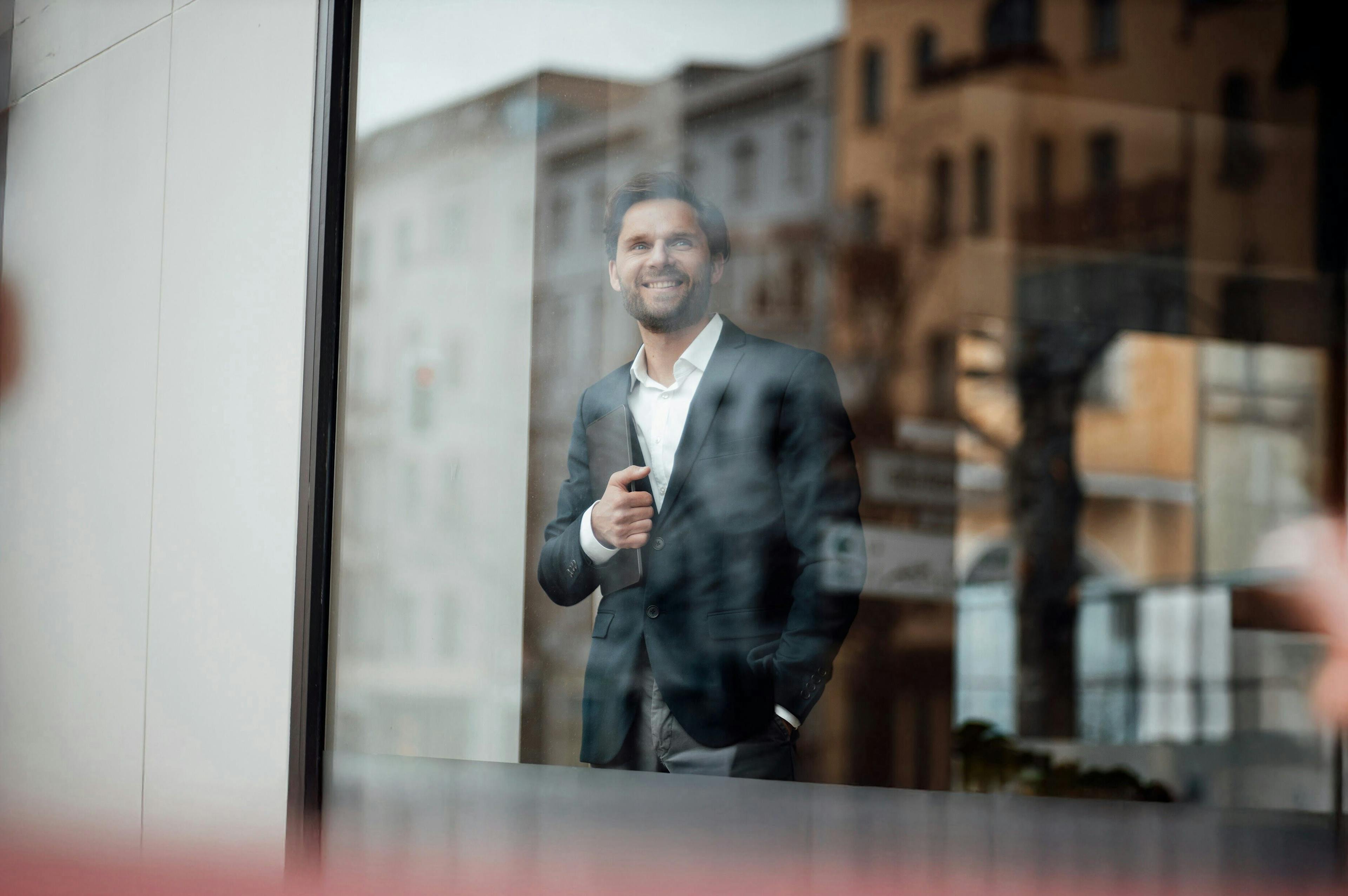 Business person looking out the window