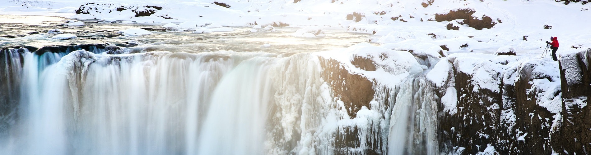 A waterfall in winter in Iceland