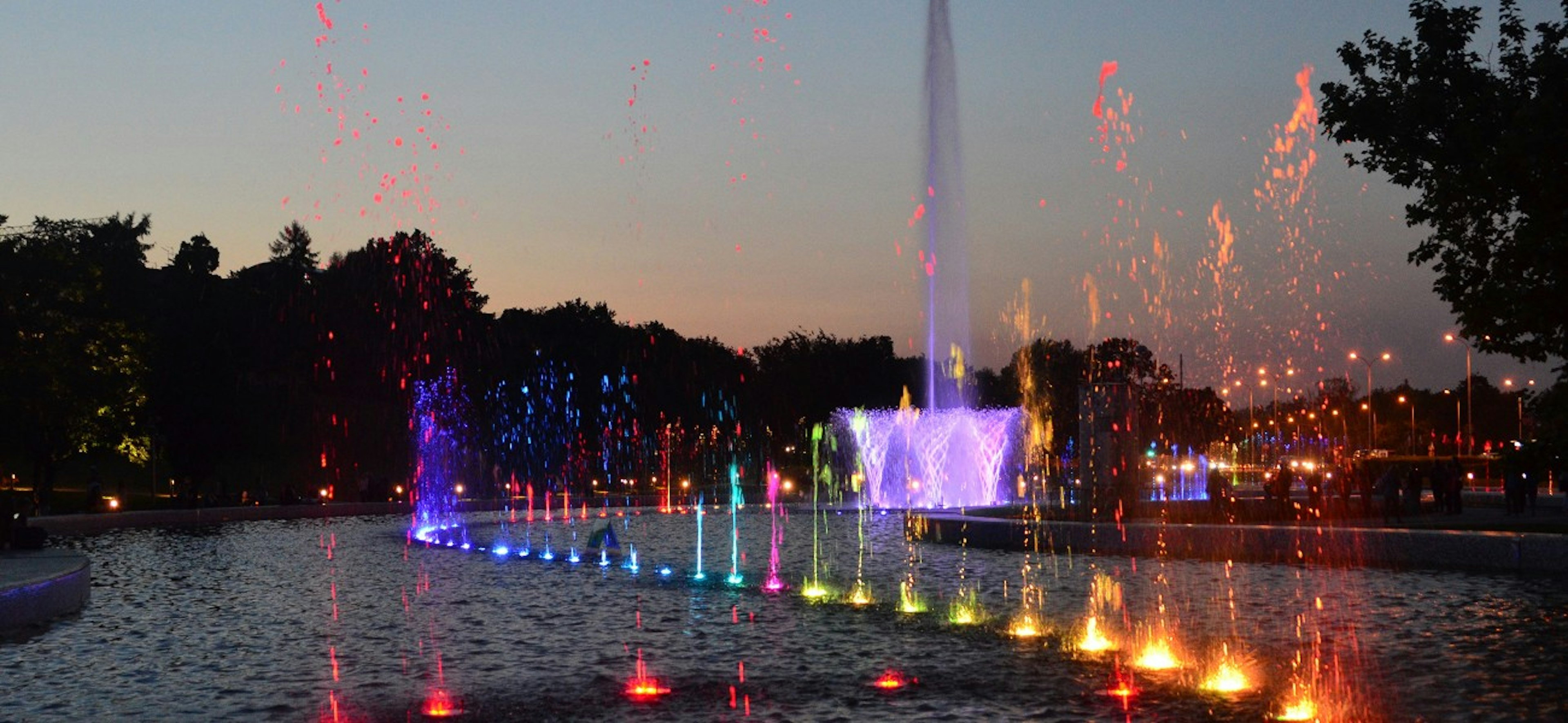 Beautiful view of Multimedia fountain park during twilight, Warsaw, Poland