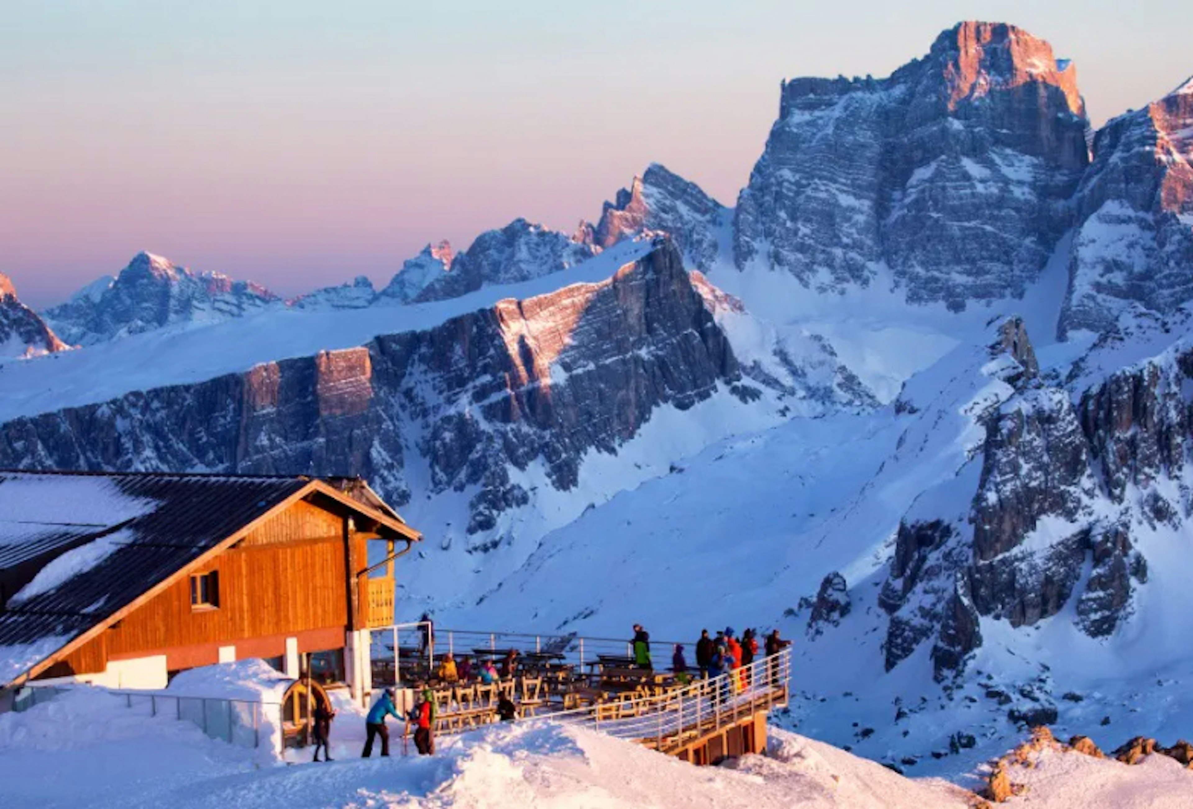 Rifugio Lagazuoi and Cable car station against the background of the Dolomites at sunset. Winter Alps near Cortina d'Ampezzo, Veneto, Italy.
