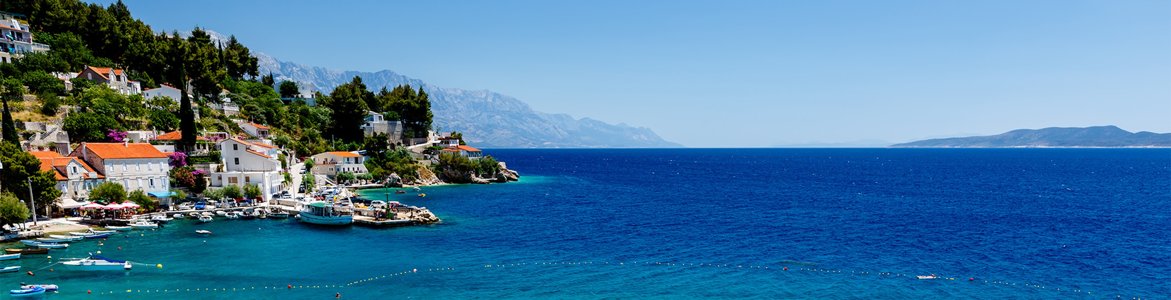 The turquoise waters off the shore of a beautiful Adriatic beach near Split in Croatia