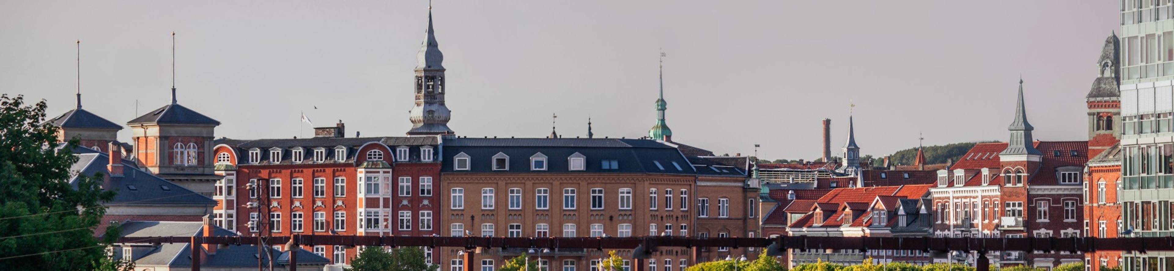 Wide panorama: Aalborg summer cityscape with most of the landmarks, Denmark