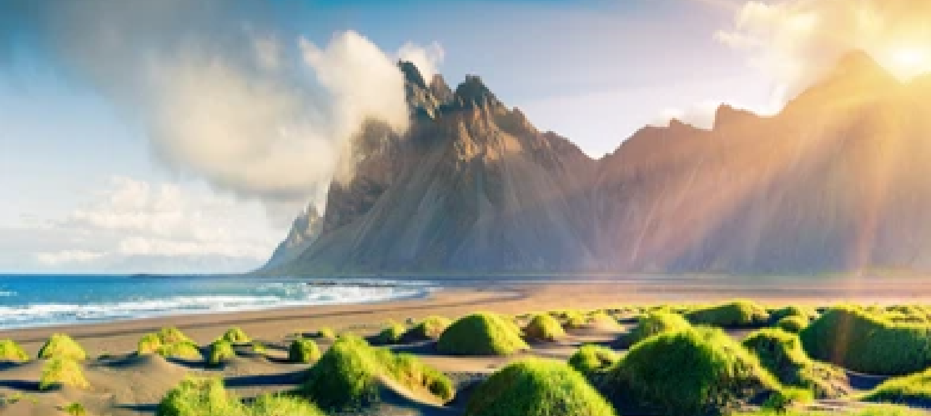 The green dunes of Stokksnes with Vestrahorn mountain in the background