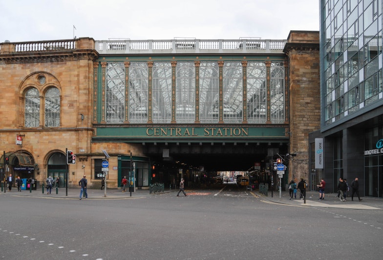 View of Argyle Street passing under the Central Station building in Glasgow, Scotland