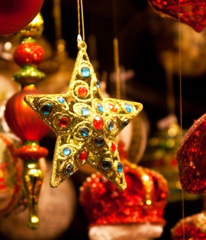 Hanging Christmas decorations in gold, red and blue