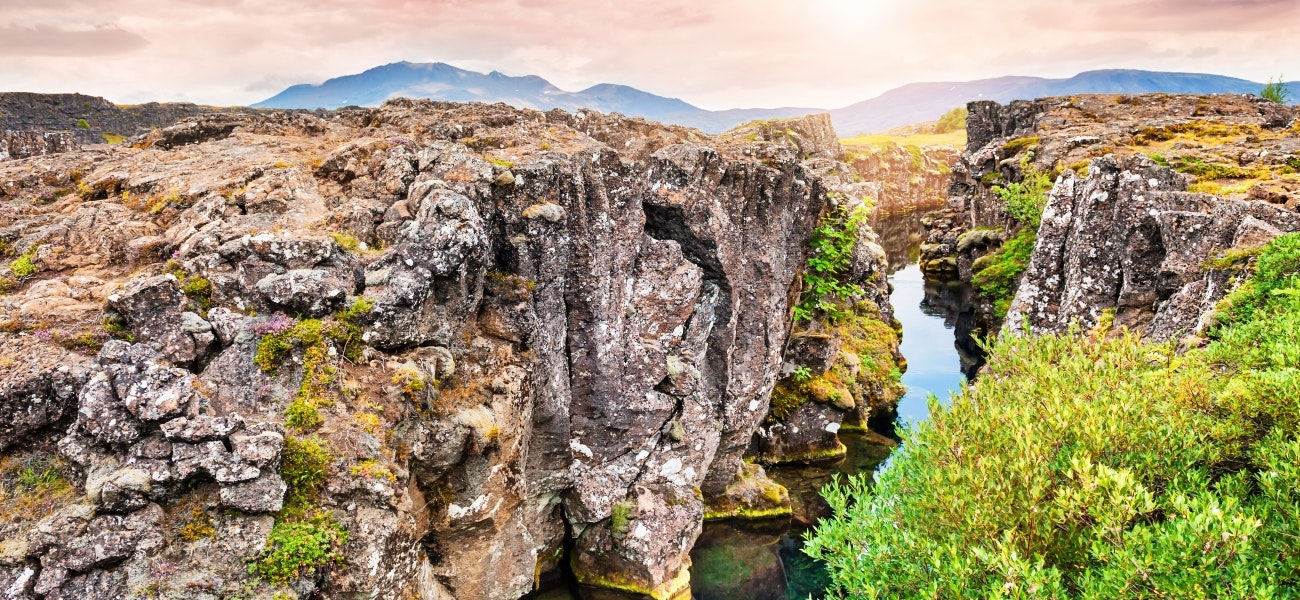 Beautiful cliffs and deep fissure in Thingvellir National Park. Southern Iceland