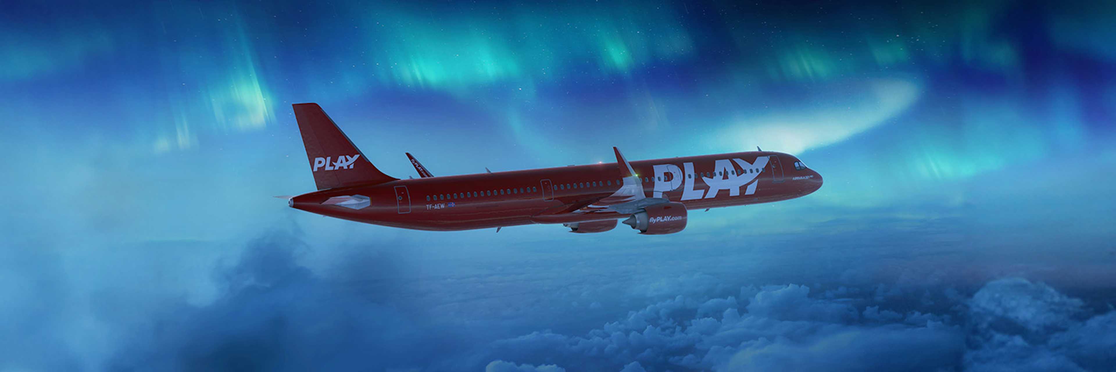 Play aircraft surrounded by northern lights