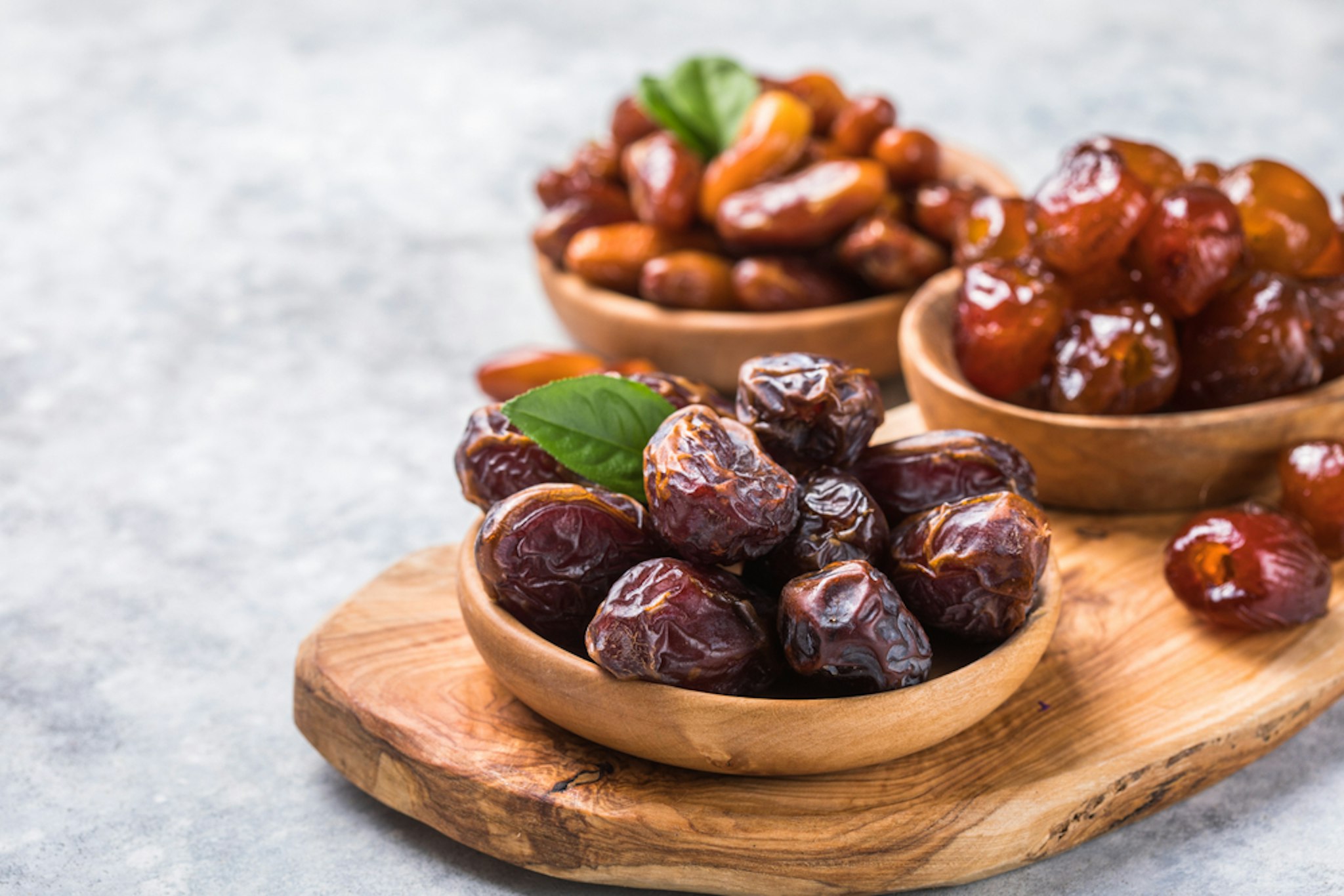 Dates in wooden bowls