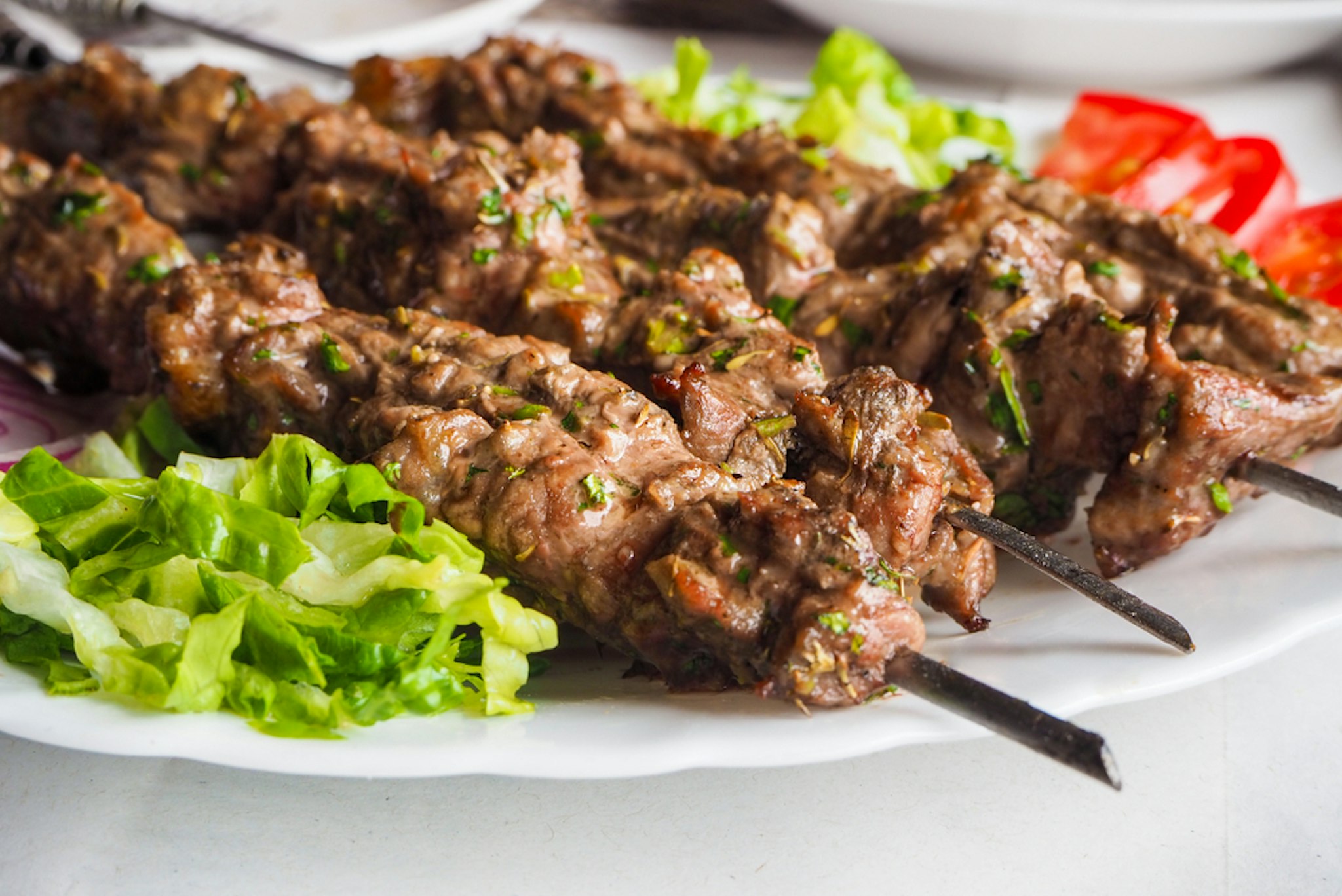 Traditional lamb kebab with salad in morocco