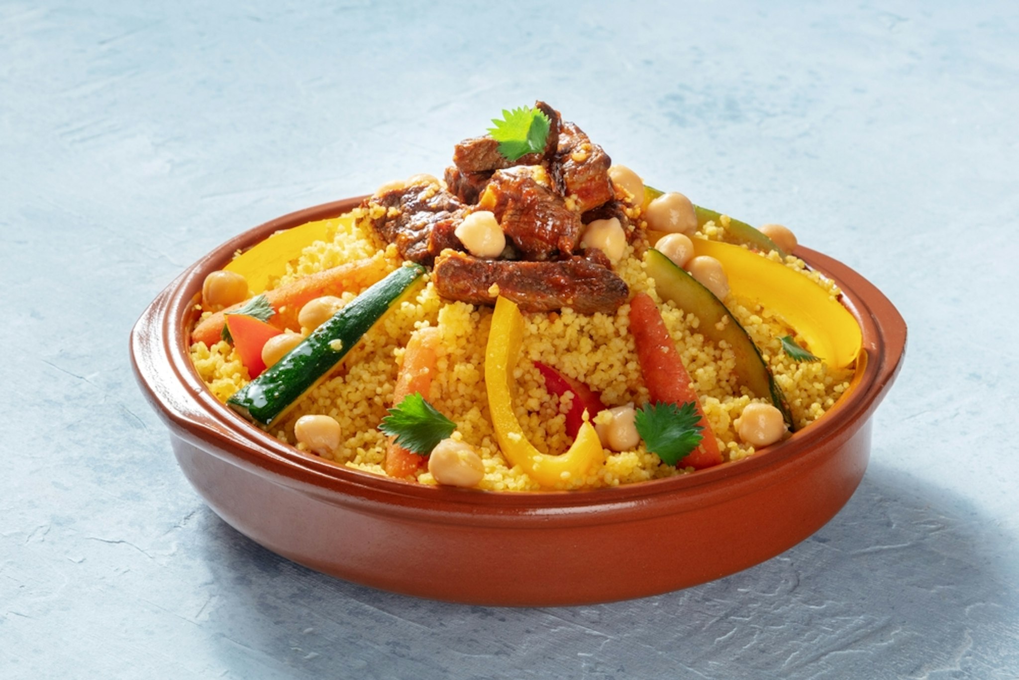 Meat and vegetable couscous in a bowl