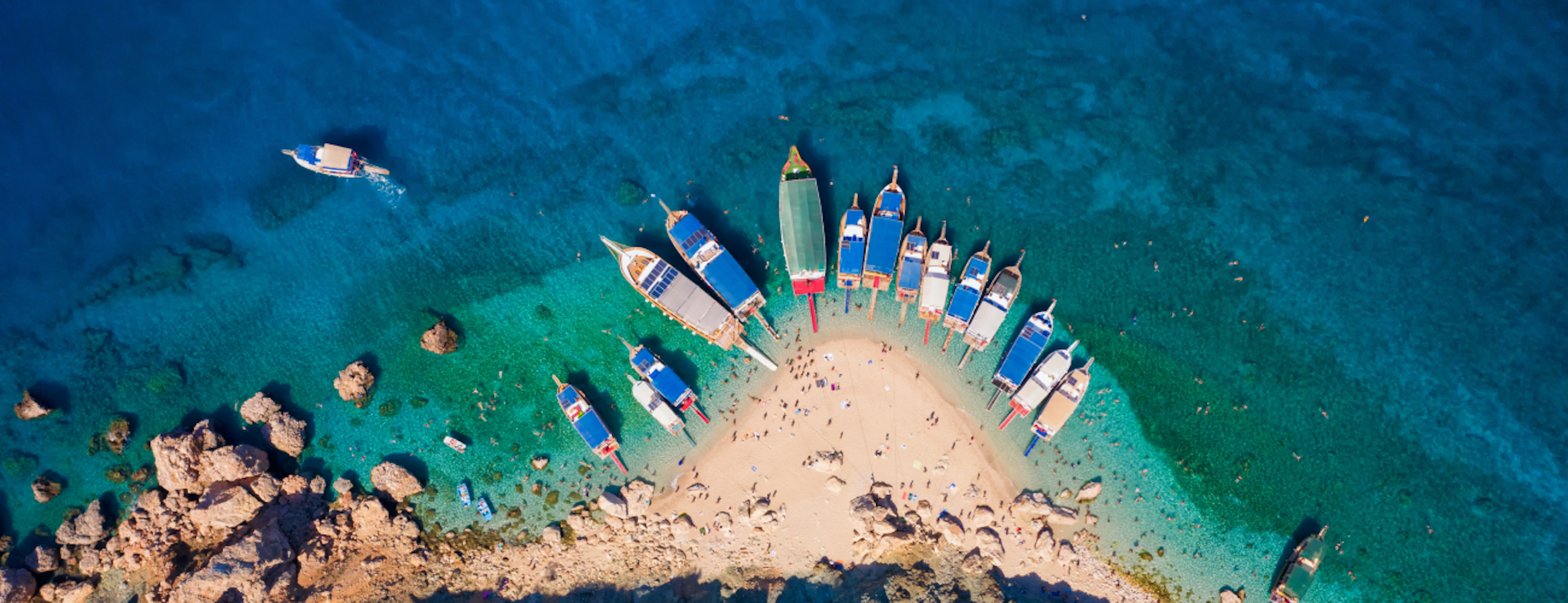 A beach and blue ocean, Antalya Turkey