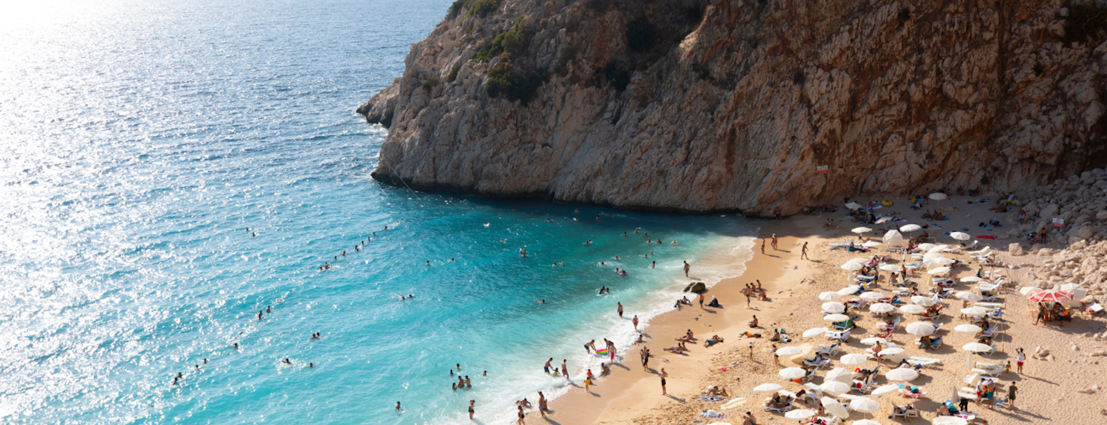 A beach and blue ocean, Antalya Turkey