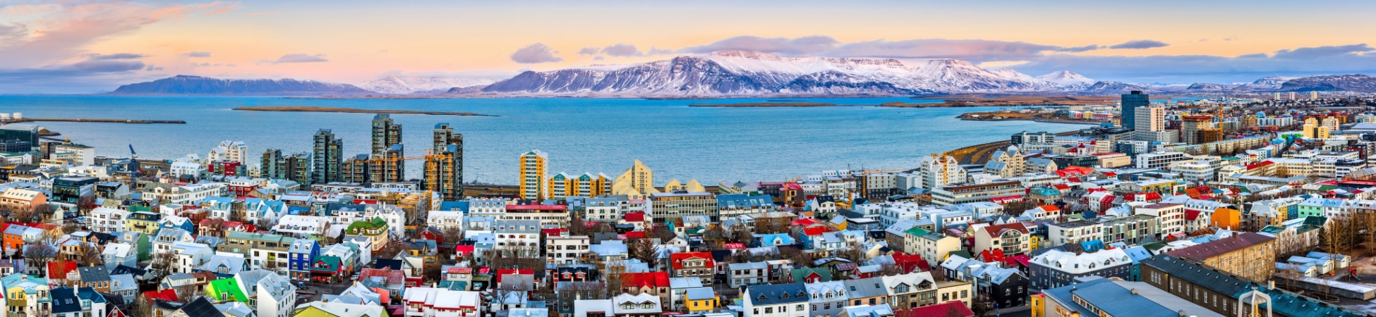 A panoramic view over Reykjavik and mount Esja in winter