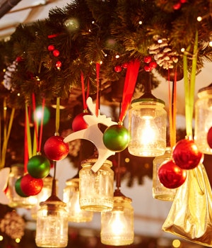 Beautifully lit Christmas decorations at a Christmas market stall 