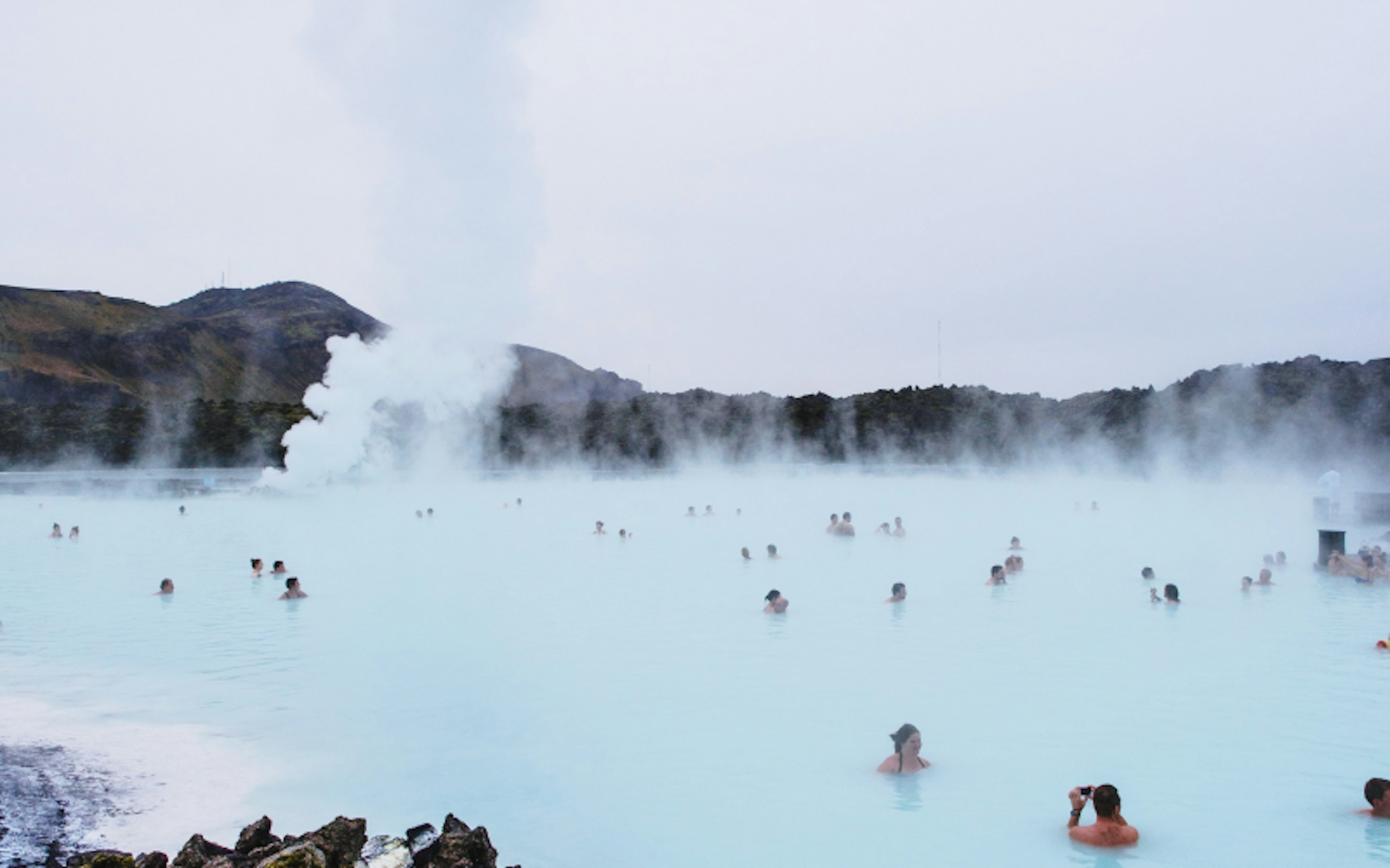 people soaking in the blue lagoon Iceland.