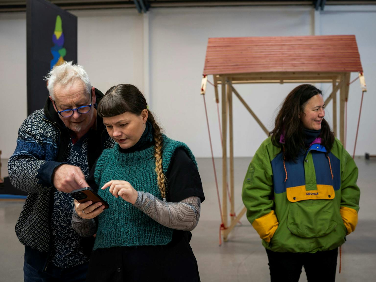 Four creative professionals in conversation with each other.