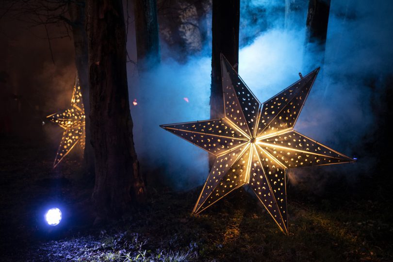 Illuminated star on misty backdrop