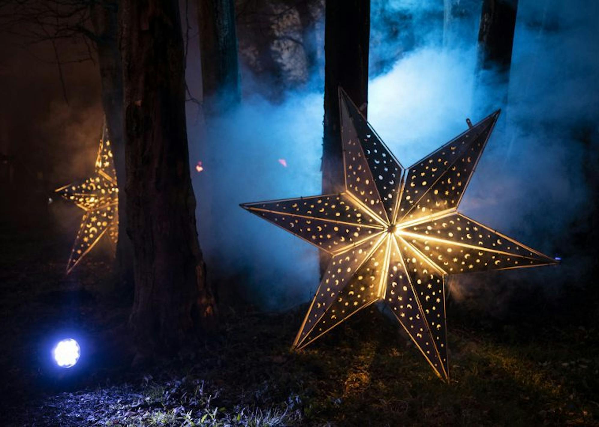Illuminated star on misty backdrop