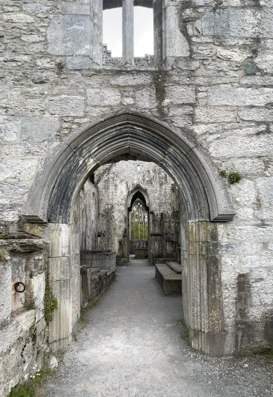 Archway of old abandoned abbey