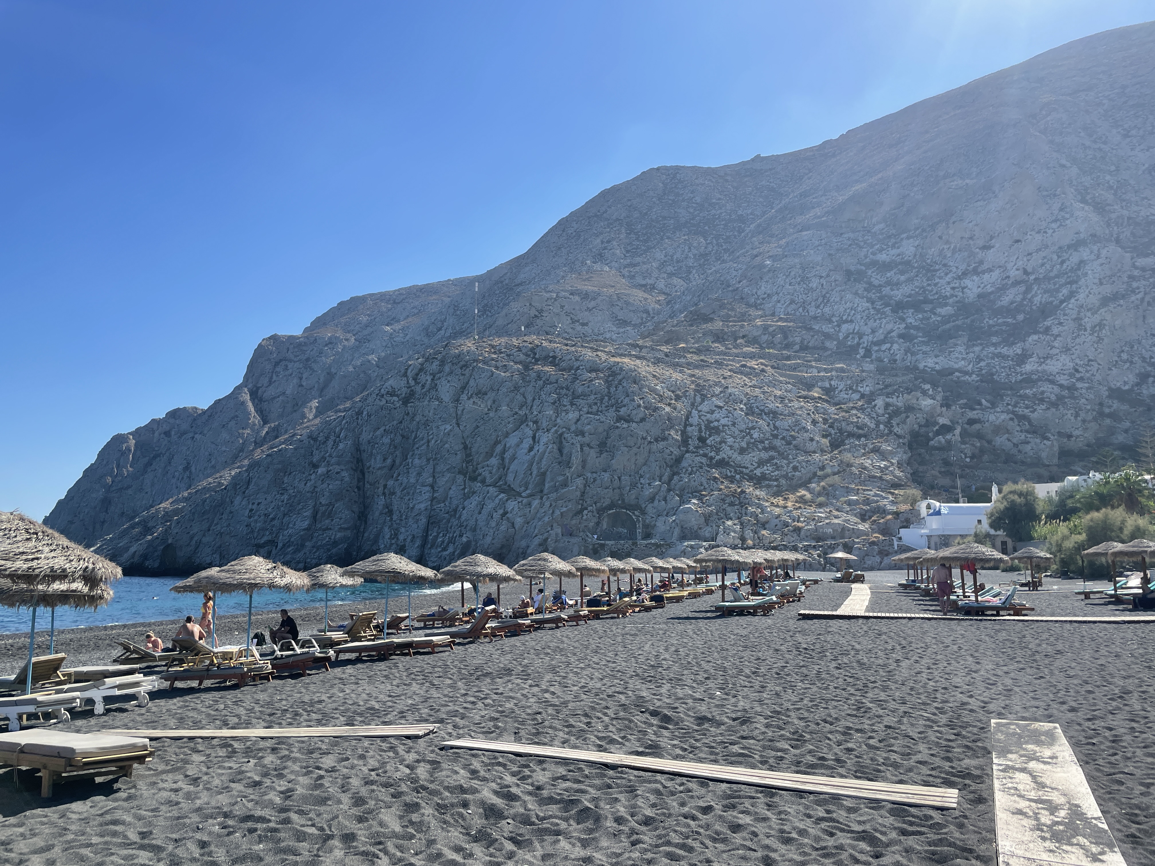 Kamari Beach in Greece with volcanic black sand