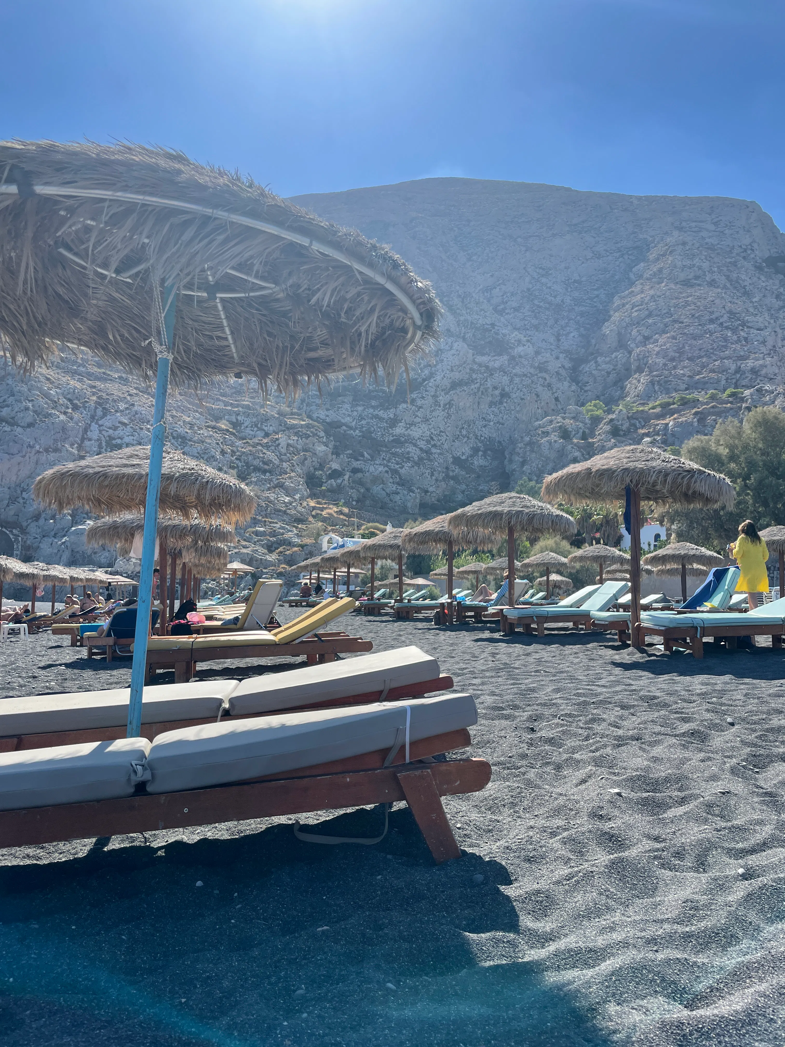 Kamari Beach in Greece with volcanic black sand