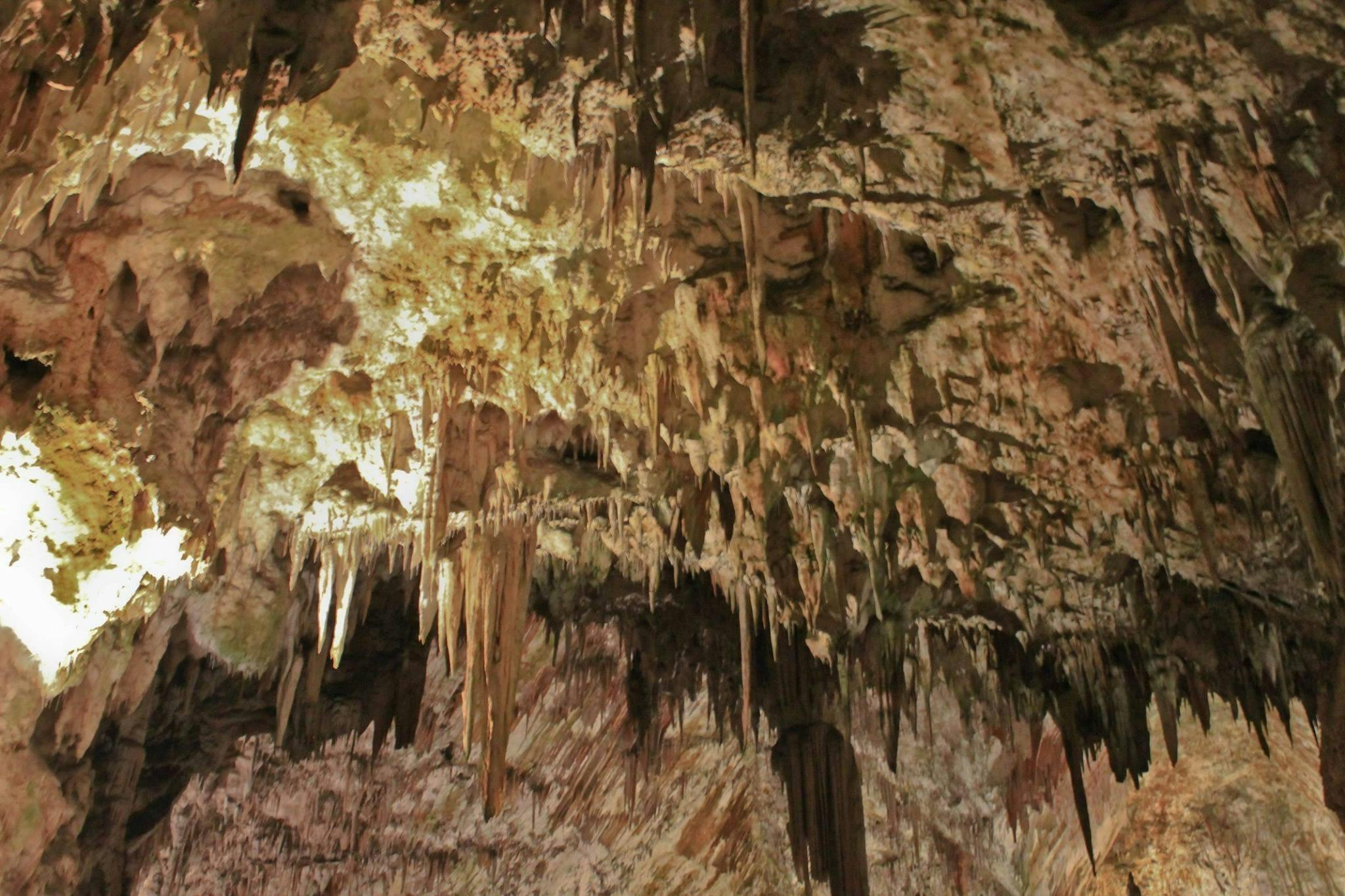 Stalactites on cave ceiling