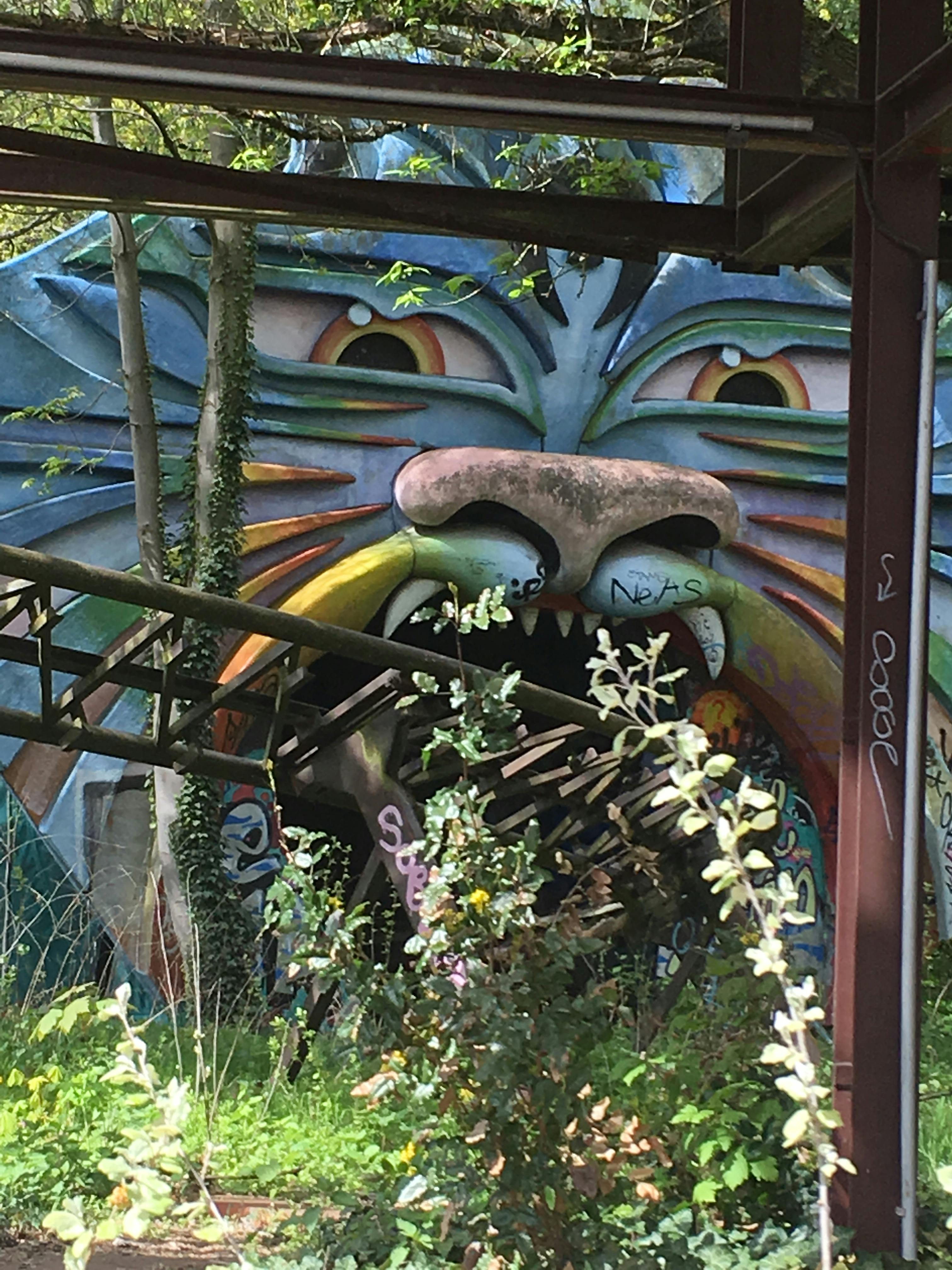 Lion face on the side of amusement park ride