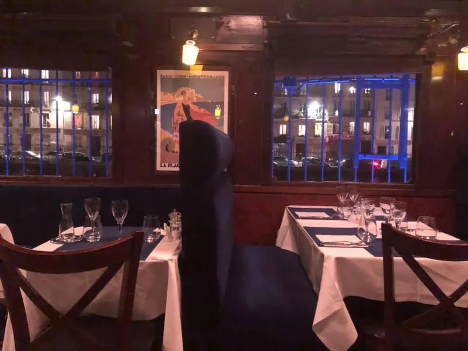 Restaurant dinner tables inside coach car