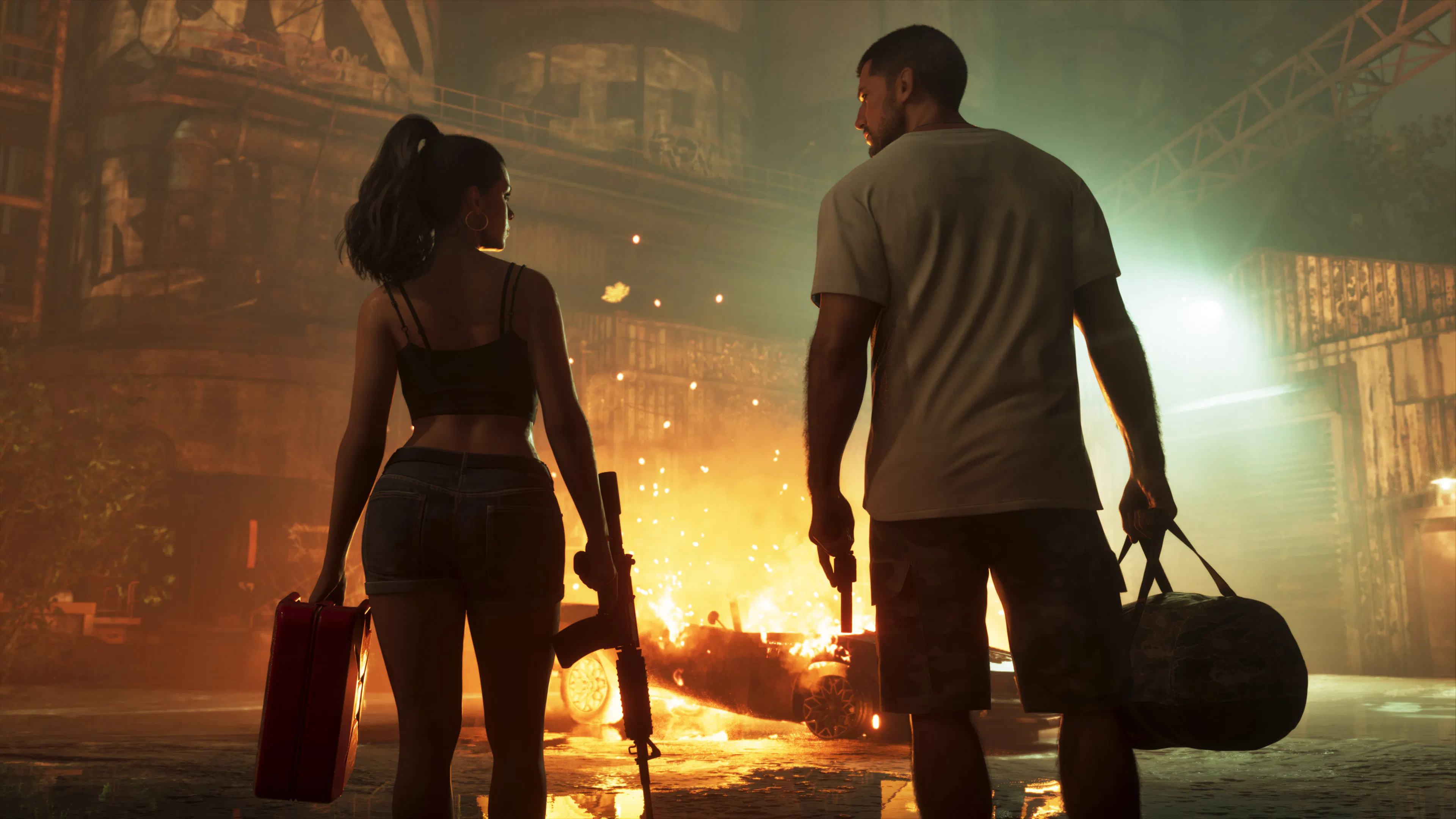 Jason and Lucia walk away from a fire with a jerry can and a duffel bag.