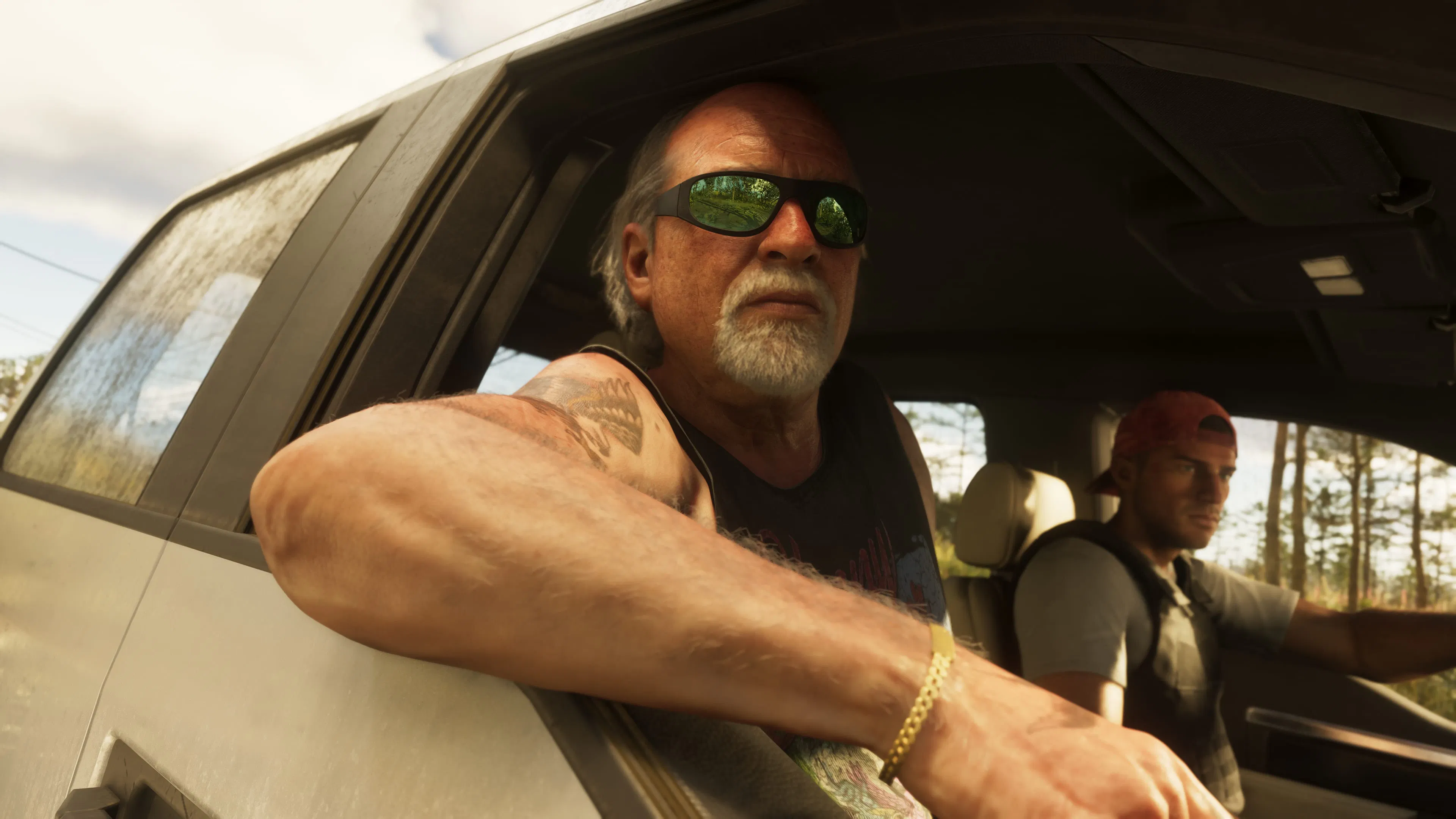Brian Heder leaning out of a truck window in green mirrored sunglasses, with Jason at the wheel.