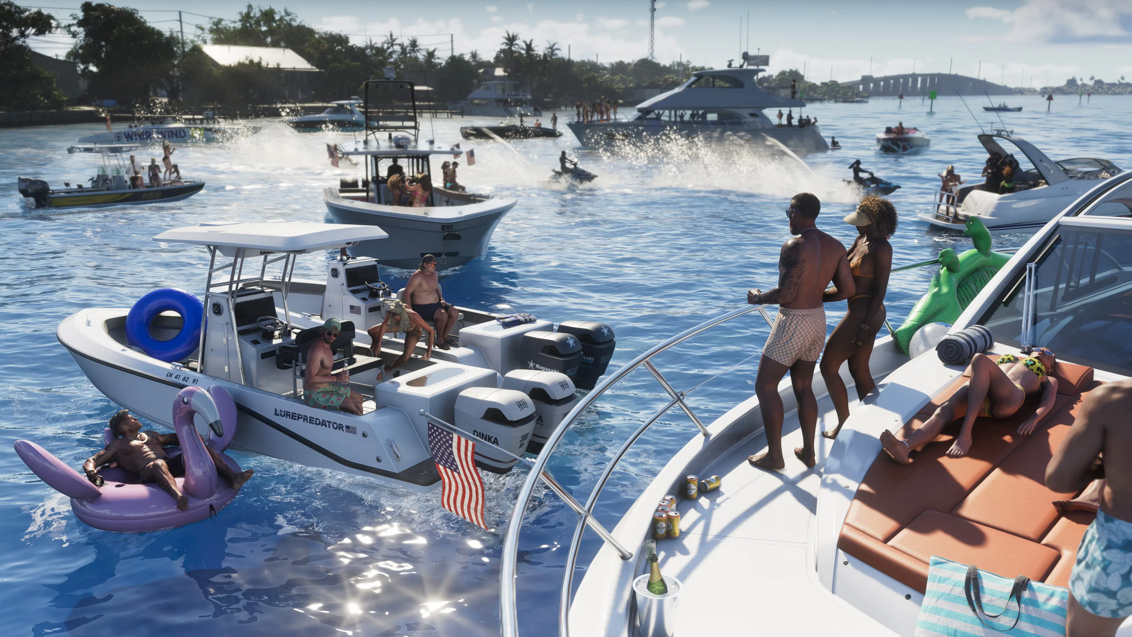 A boat party on a sandbar, with a pink flamingo float.