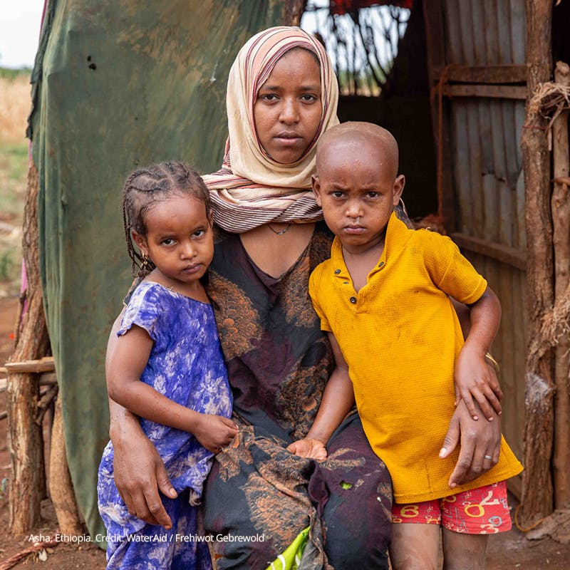 Photo of Asha and her children