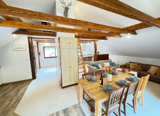  In the picture - preserved table in the living room of a natural style two-storey house