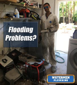 Man cleaning flood